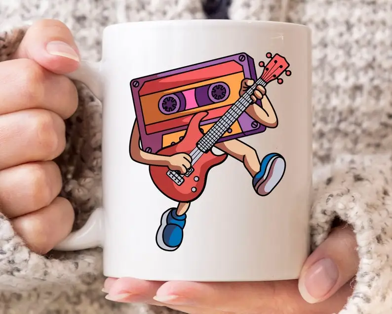 

Funny Cassette Tape Playing Electric Guitar Mug, Electric Guitar, Guitar Lovers, Guitarist Cup, Instrumentalist, Casette Tape, M