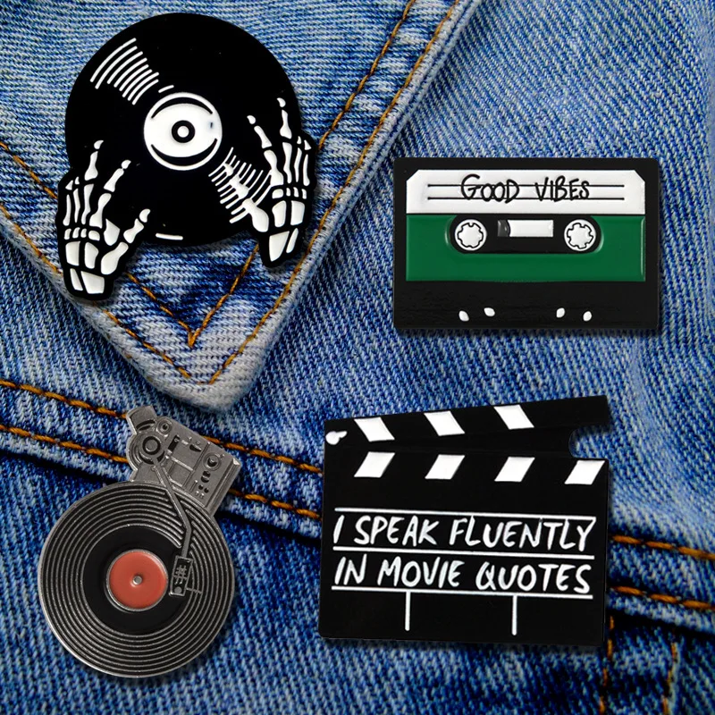 

Classic cartoon creative personality tape brooch phonograph alloy skeleton fingers vinyl micro chapter female shape