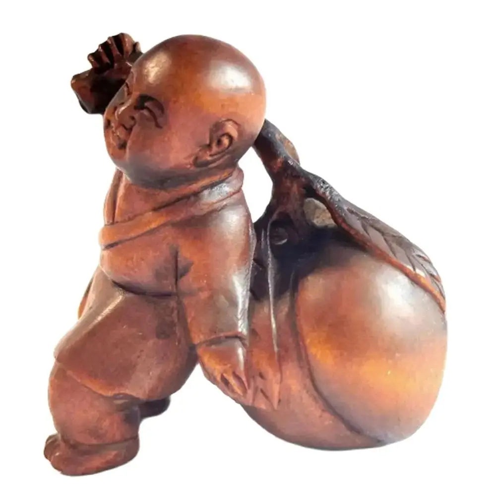 

Деревянная скульптура Netsuke "Маленький монах и персик"