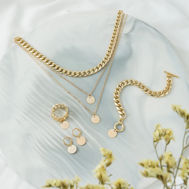 Женский комплект из колье серёг браслета и кольца