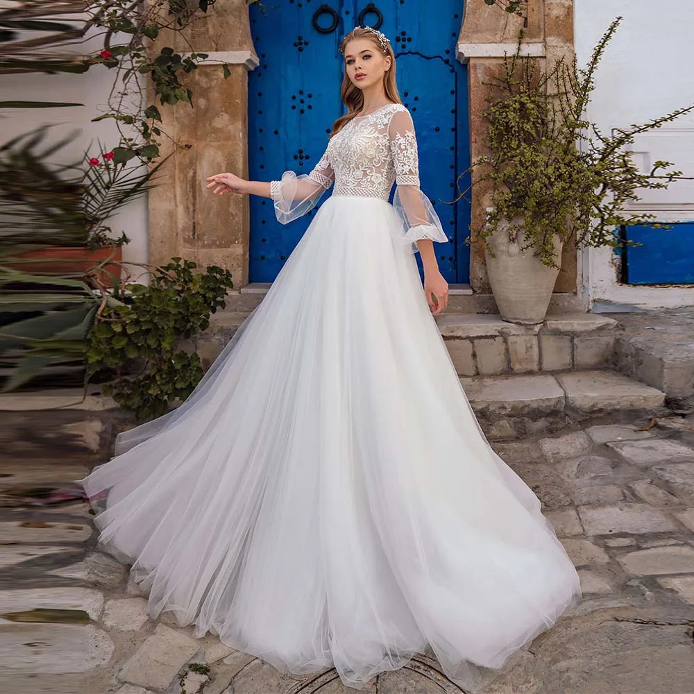 

Bohemian Bride Dress 2022 New Beaded Lace Appliques O-Neck Bridal Gown Illusion Long Sleeve Button A-Line Tulle Wedding Dress