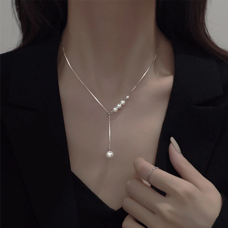 

New Tassel Pearl Necklace Women'S Light Luxury Design Pull Clavicle Chain Cold Wind Simple French Necklace Jewelry
