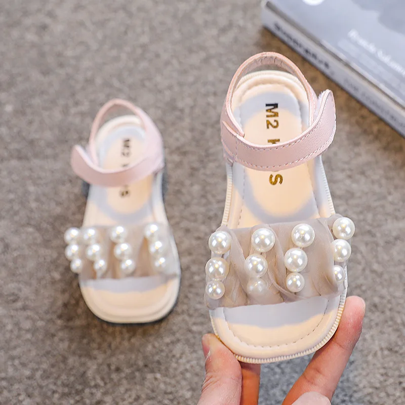 

Сандалии для девочек с жемчугом, однотонные, Нескользящие, мягкая подошва, модные босоножки, плоская подошва, для начинающих ходить детей, л...