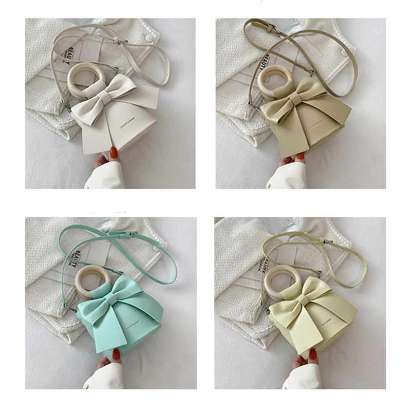 Women's Bag 2022 Trend New Solid Wood Ring Solid Color PU Portable Bucket Bag Fashion Bow One Shoulder Messenger Bag