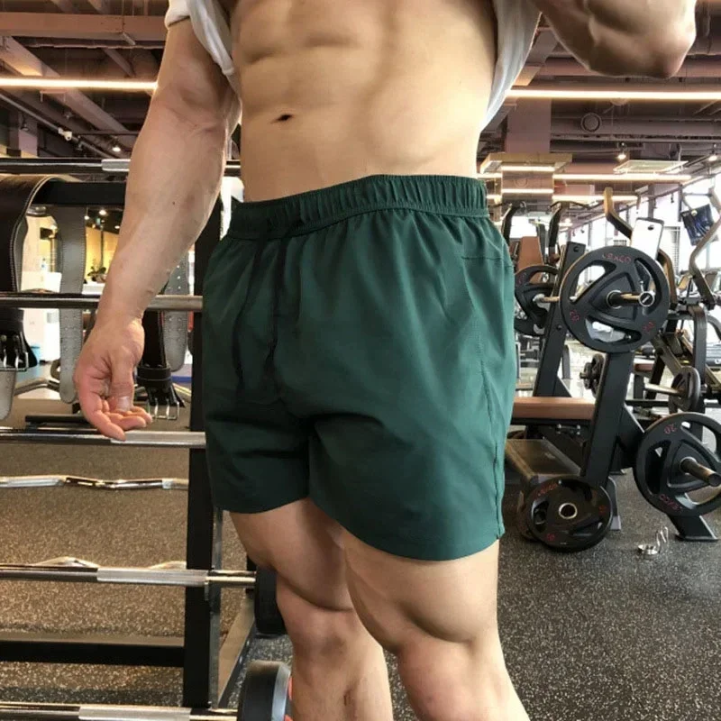 Мужские повседневные спортивные шорты эластичные пляжные для бега фитнеса