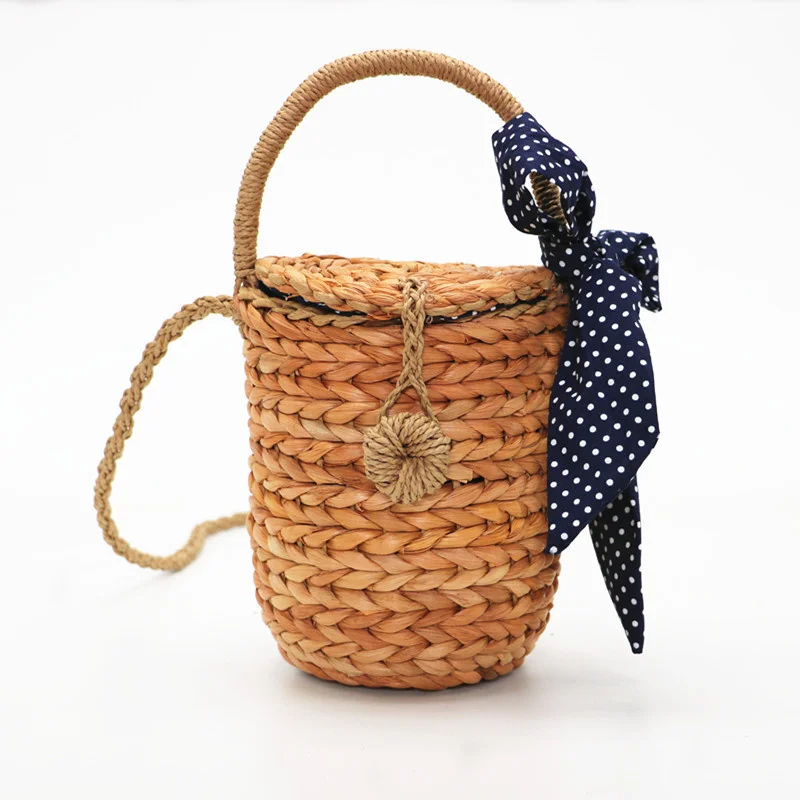

2018 Summer New Cylinder Carrying Straw Bag Wave scarf towel Woven Leisure Bag Ribbon Messenger Bag Portable Bucket
