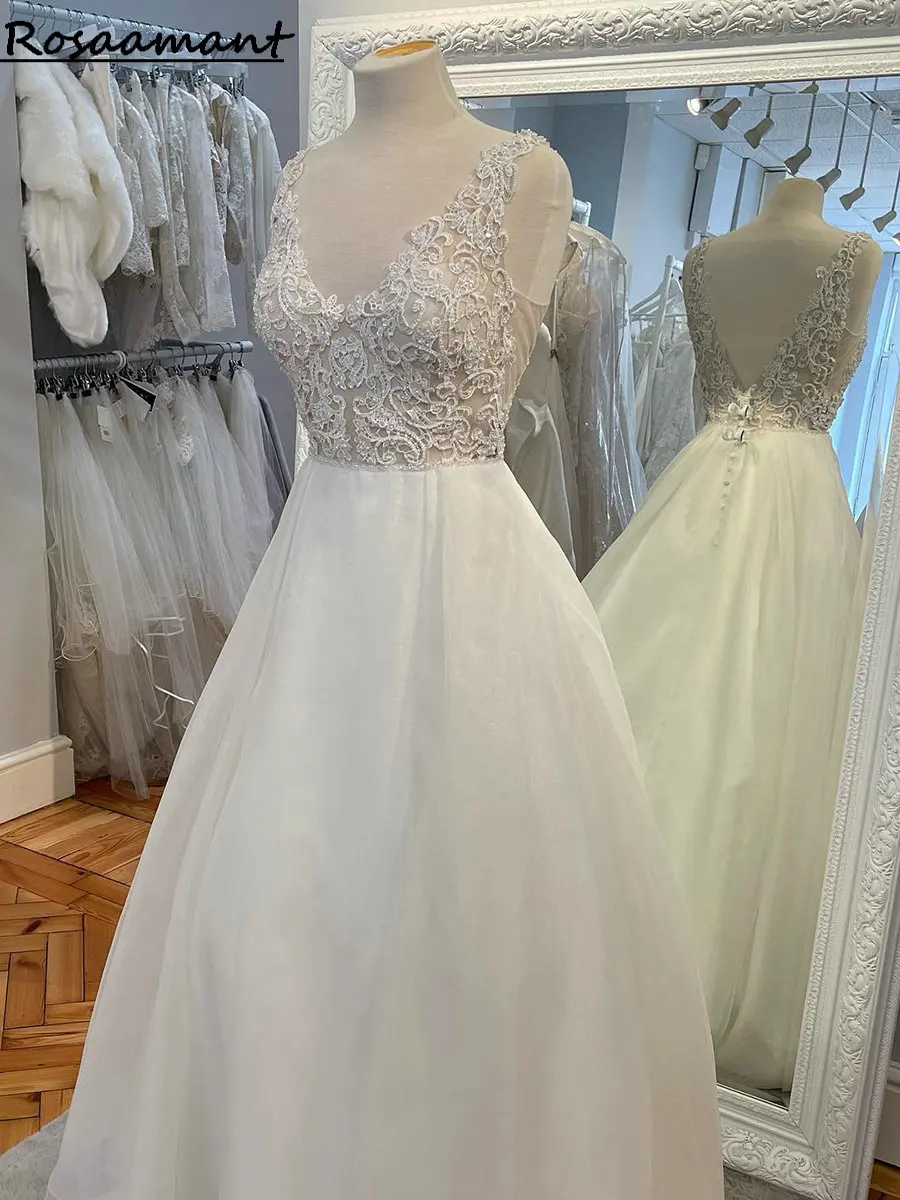 

Реальное изображение иллюзии Жемчуг Бисероплетение Свадебные платья а-силуэта V-образный вырез свадебное платье с аппликациями и открытой ...