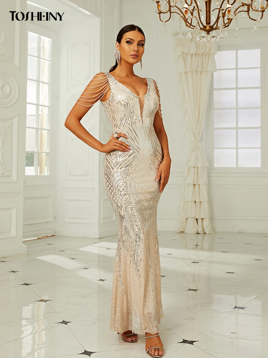 Женское вечернее платье с открытой спиной блестками и бахромой