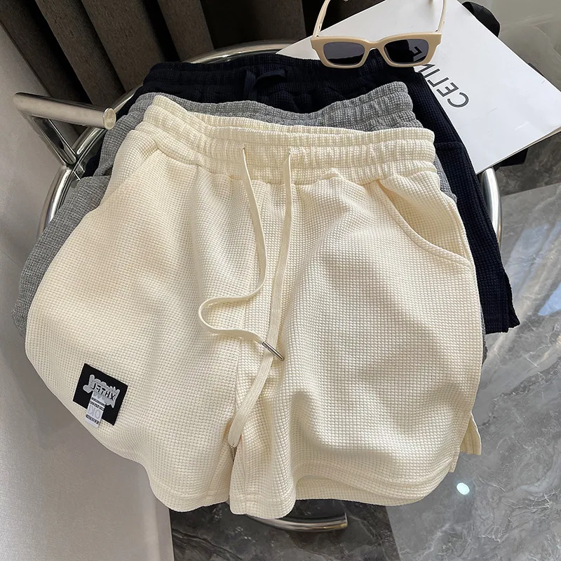 

Korean Fashion Waffle Fabric Bermuda Shorts Summer Loose Casual Drawstring Waist Design Short Joggers Sweat Shorts Women 2022