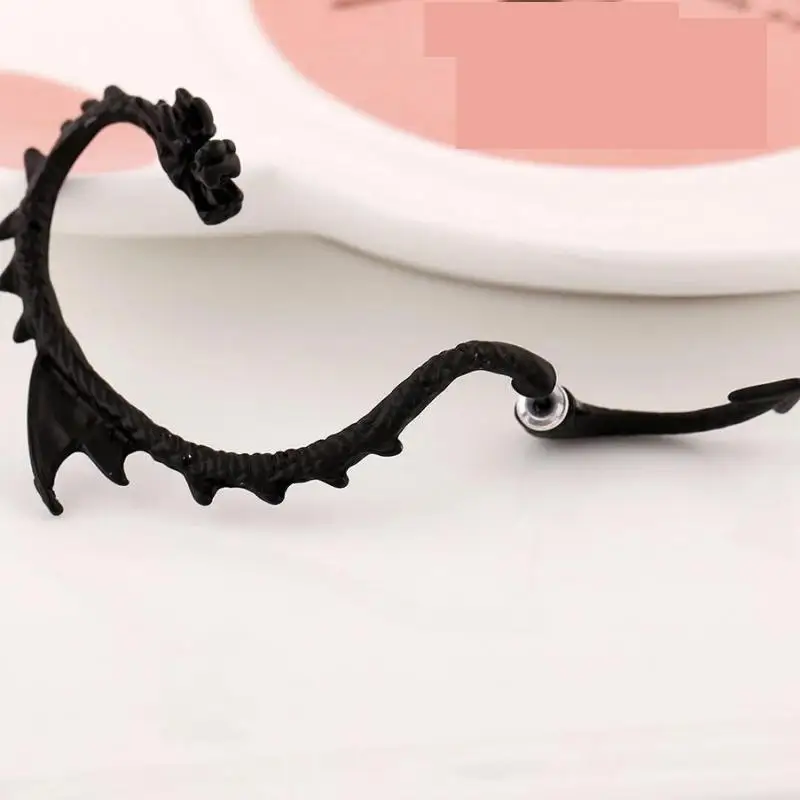 Женские серьги-клипсы в виде дракона |