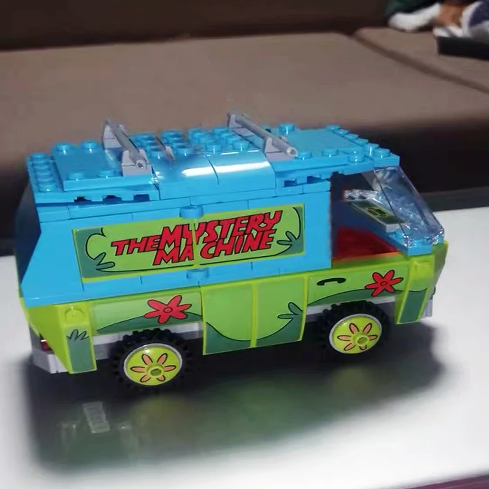 

Модульная модель Moc с машинкой для загадок, 75902 идей, строительные блоки, кирпичные фигурки из фильма, игрушки для детей, подарки на день рожд...
