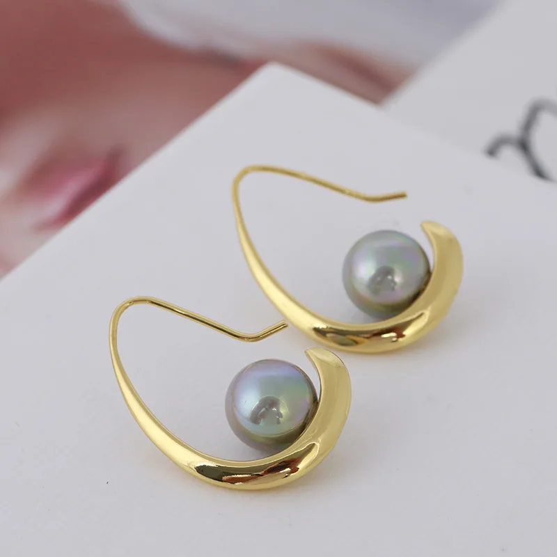 

Metallic Moon Boat Embellished Grey Pearl Earrings