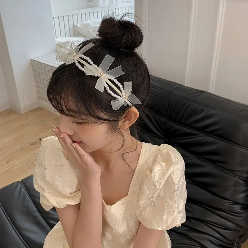 Design sense mesh bow pearl headband net red 2022 new hairpin headband female pressure hair hair bundle jewelry