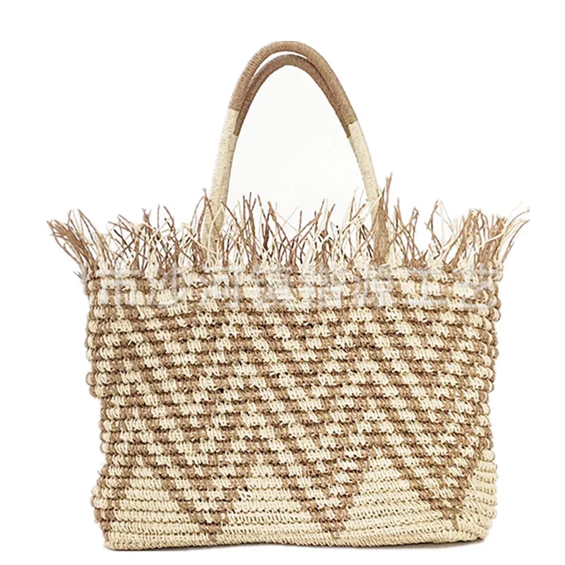 2022 new bag women's tassel geometric pattern crochet hand-held shoulder beach woven straw |