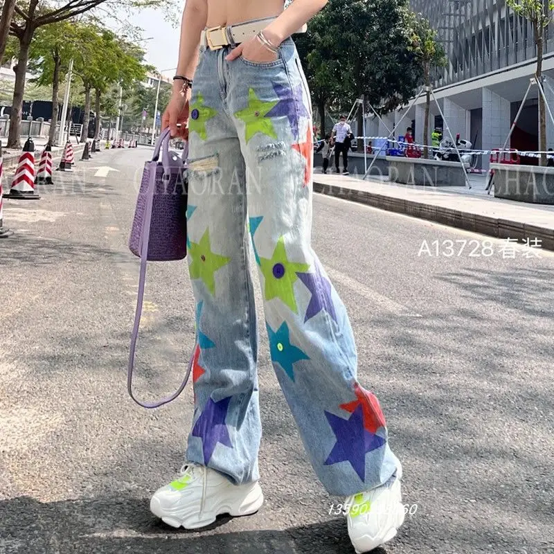 

Jeans female 2022 spring European goods heavy-duty broken hole wide leg trousers stars colorful print do old thin trousers tide