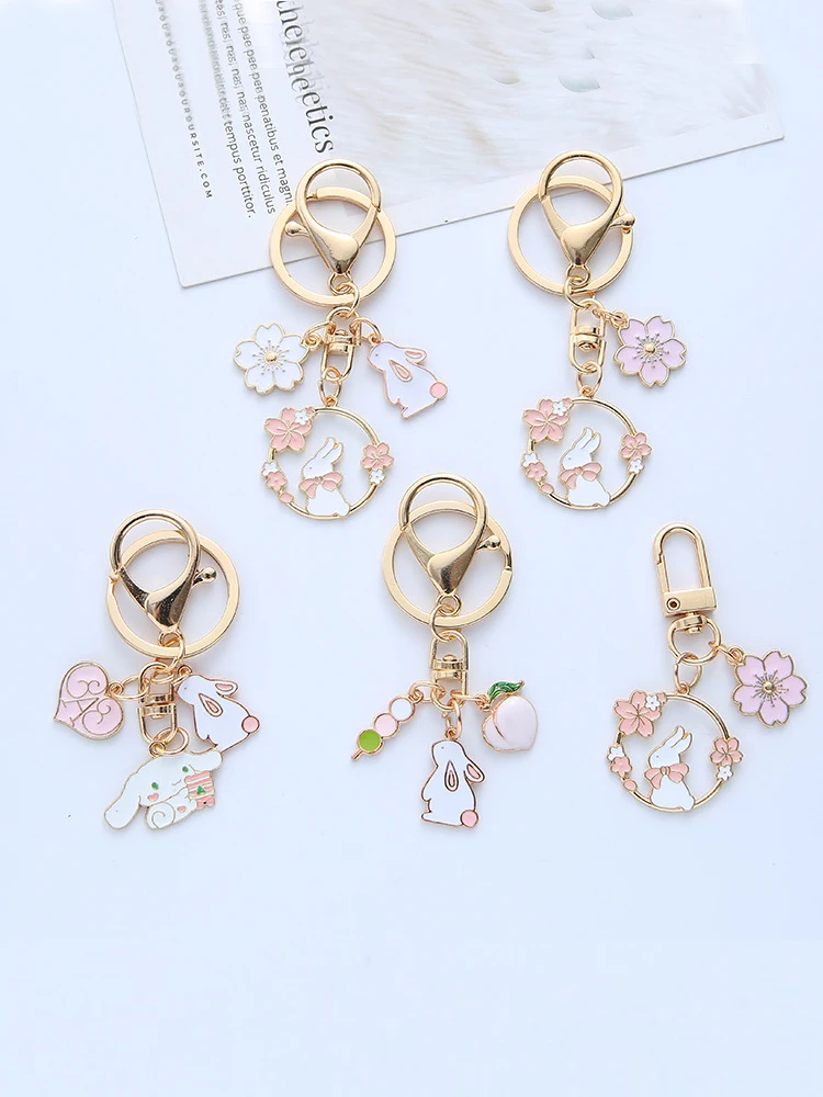 

Sanrio Cinnamoroll Anime Cute Cartoon Rabbit Alloy Keychain Sakura Decorative Accessories Bag Car Key Pendant Girl Birthday Gift