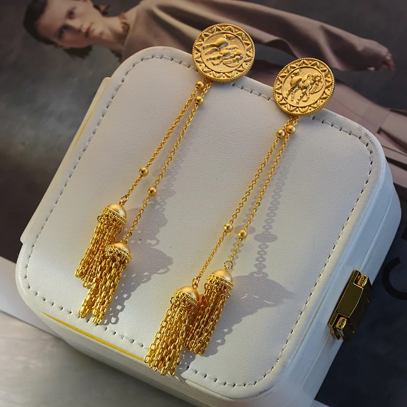 

Retro earrings women's niche design metallic studs new fringe long earrings