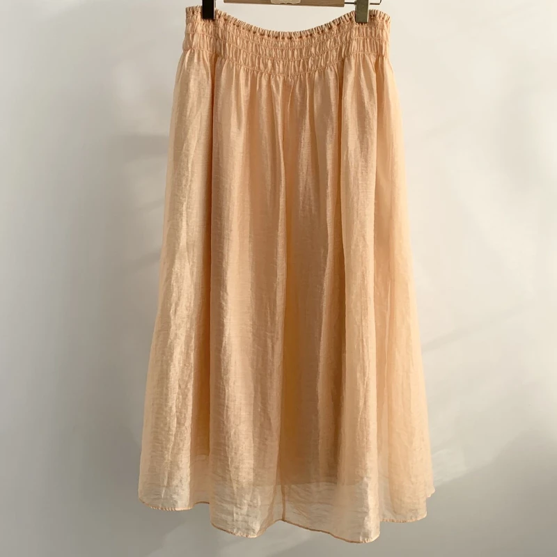 

2023 Spring and Summer New Apricot Yellow Elastic Waist Shirring Mid-length Skirt Women