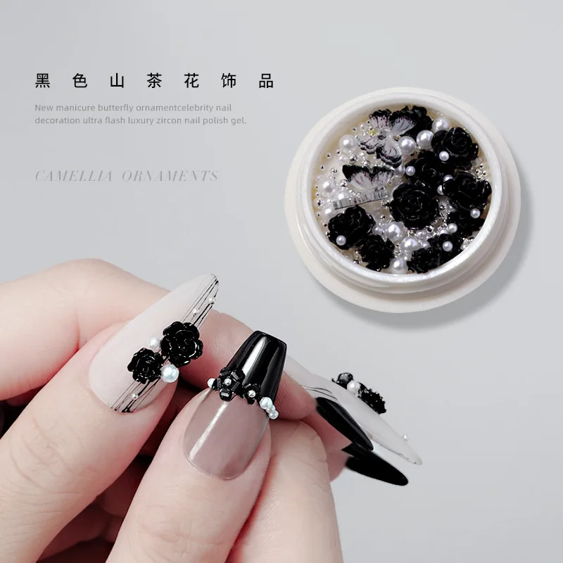 

1 Box Mix Nail Decoration 3D Black Camellia Flowers Resin Nail Art Aurora Butterfly Rhinestones Pearl Rose Manicure Nails Charms