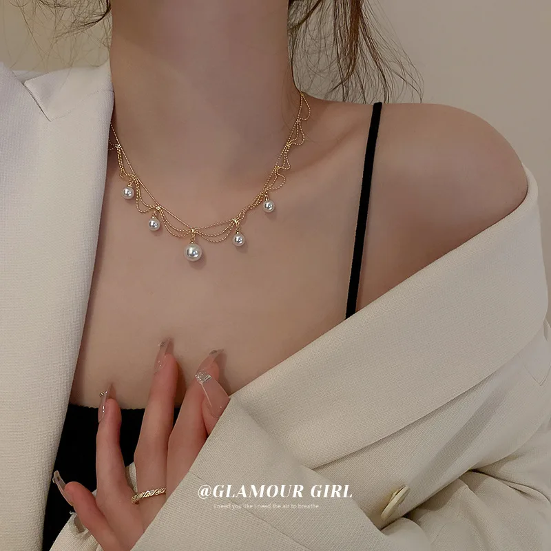 

New fashion temperament pearl pendant necklace French personality retro design sense high-end light luxury necklace