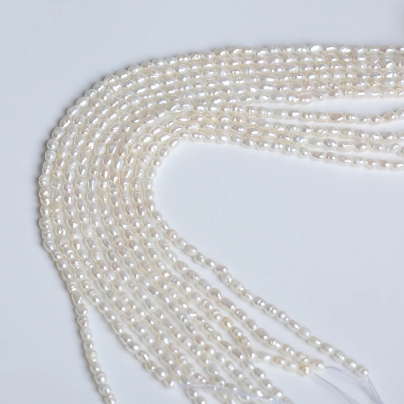 Оптовая продажа Пресноводный Жемчуг в форме белого риса 2-2 6 мм короткие нити 18 см