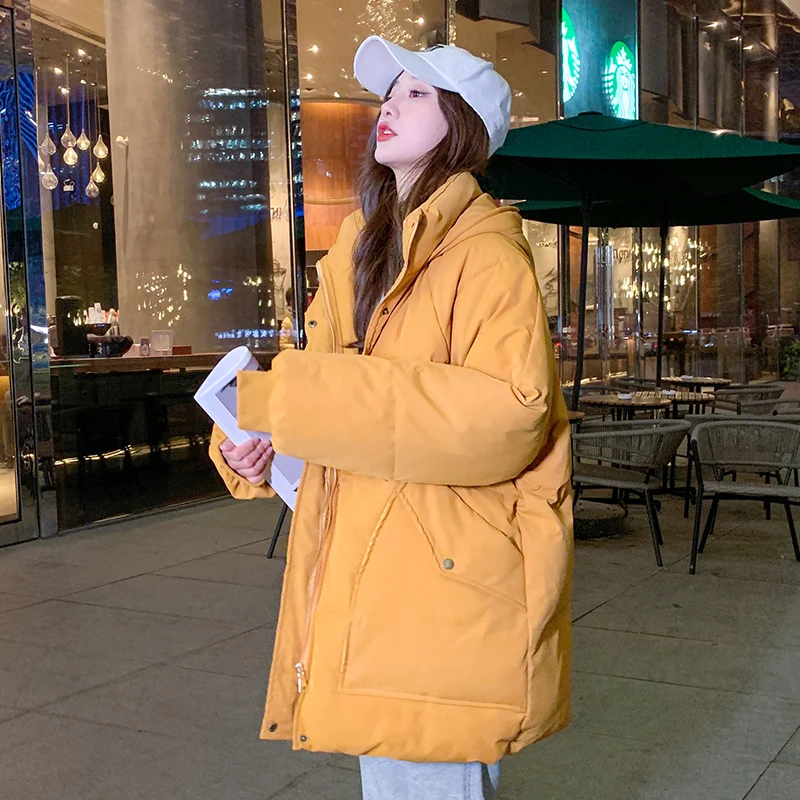 

Женская утепленная парка средней длины, повседневная однотонная Свободная куртка с большими карманами и капюшоном, верхняя одежда для осен...