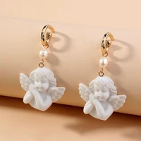 cute white stone angel earrings for women girl 2020 gold color metal angel wing faxu pearl drop dangle earrings party jewelry
