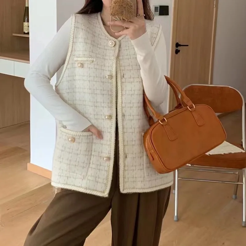 

worn with a small fragrance imitation mink down horse clip women's autumn and winter sweater women's knitted vest top trend