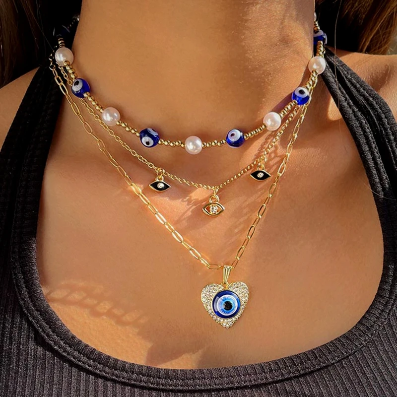 

JUST FEEL Trendy Evil Eye Beads Pearl Choker Necklace For Women Multi-layer Heart Eyes Crystal Pendant Necklace New Jewelry Gift