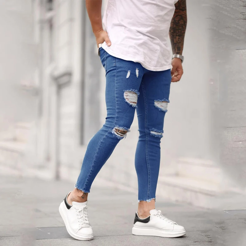 European and American new men's ripped elastic skinny skinny jeans torn nine-point jeans Youth fashion trend casual trousers