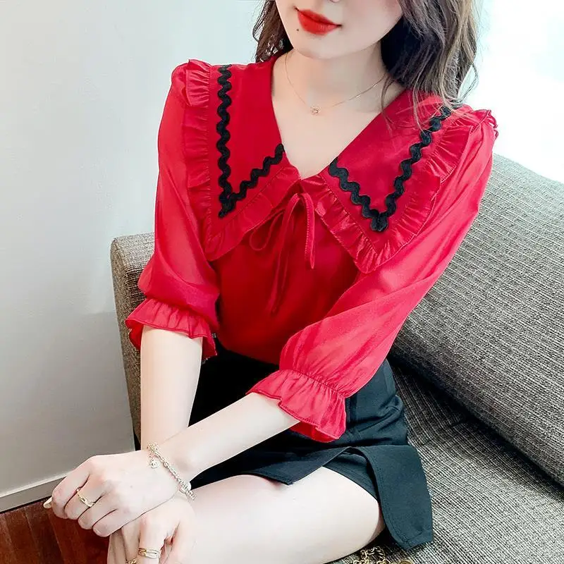 

Blouse Western temperament doll collar chiffon shirt female 2022 summer design sense niche small shirt thin female blouse tops