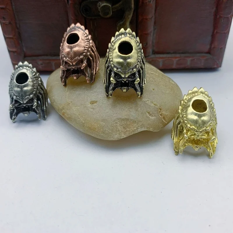 

12G Alien Beast Face Iron Warrior Knife Bead Handmade Woven Paracord Lanyard DIY Pendants Jewelry Accessories Brass EDC Outdoor