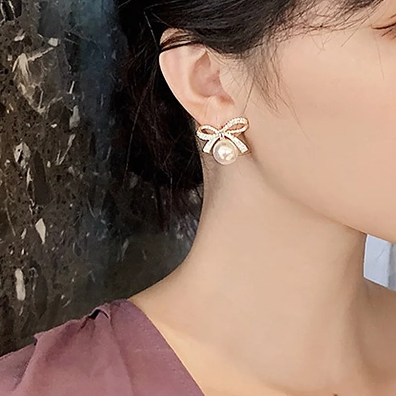 

New Arrival Trendy Sweet Simulated-pearl Bowknot Stud Earrings For Women Students Elegant Fashion Crystal Jewelry