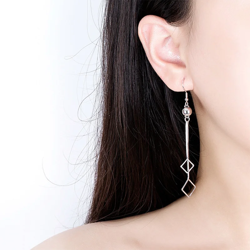 Длинные квадратные двухслойные серьги с кисточками розового золота и