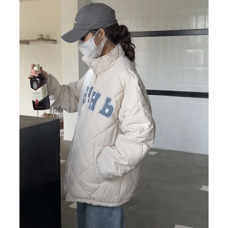 Женский зимний пуховик с вышивкой и защитой от ветра