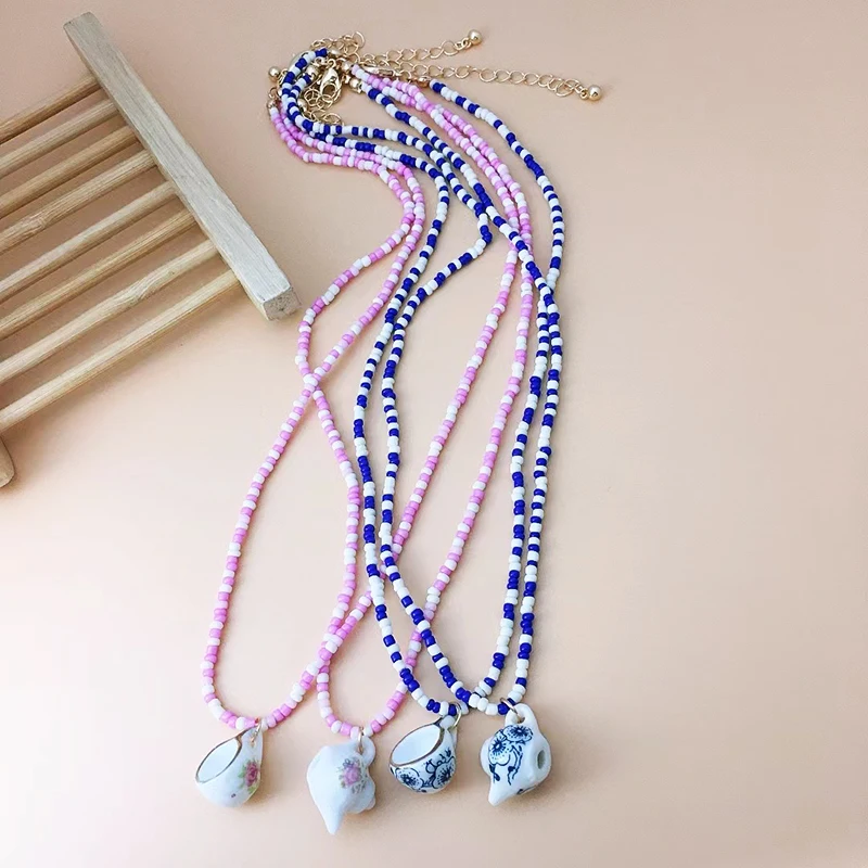 Женское винтажное ожерелье ручной работы из рисовых бусин с синей и белой эмалью