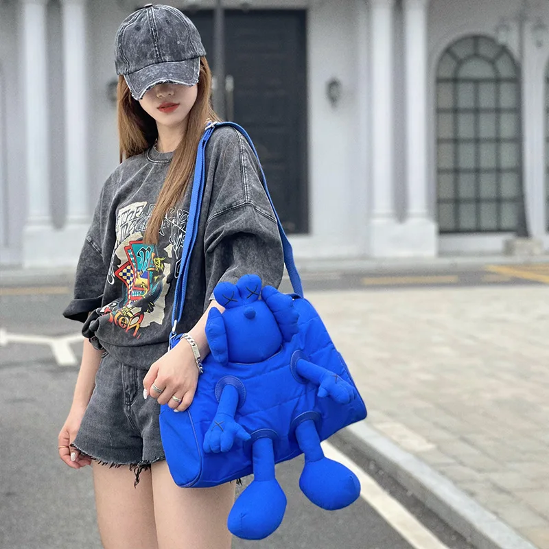 

Fashion trend lightweight anti-living water Oxford cloth three-dimensional little monster doll pillow bag shoulder messenger bag