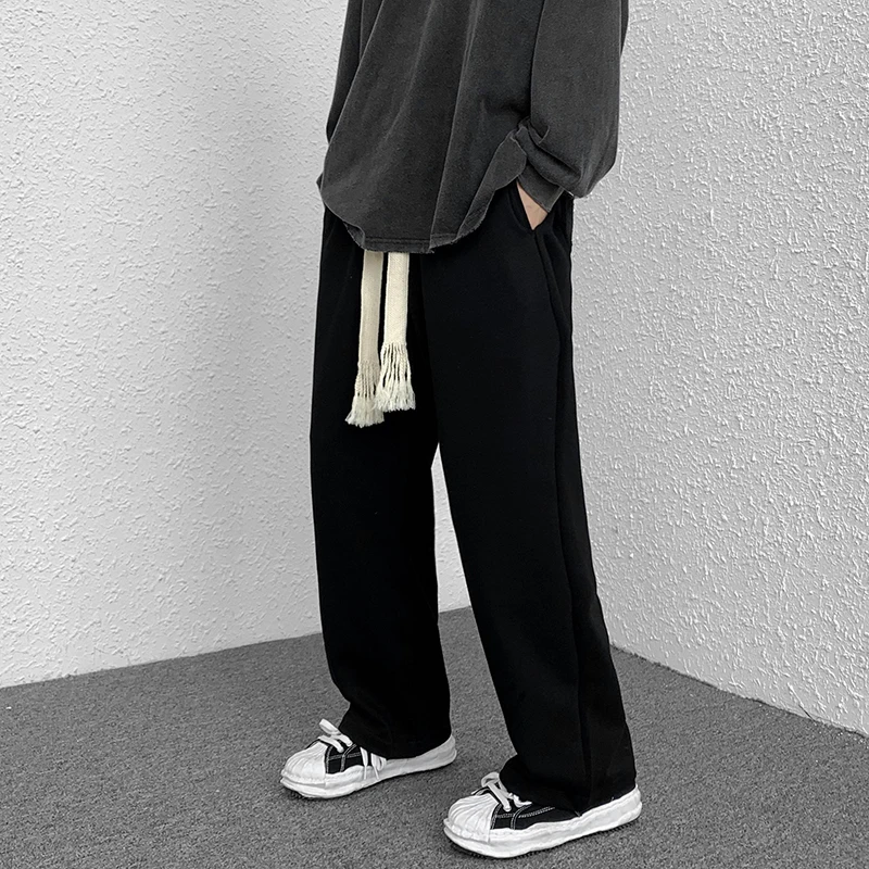 

Брюки мужские повседневные с широкими штанинами, свободные однотонные штаны, Красивые прямые драпированные универсальные брюки на шнуровк...