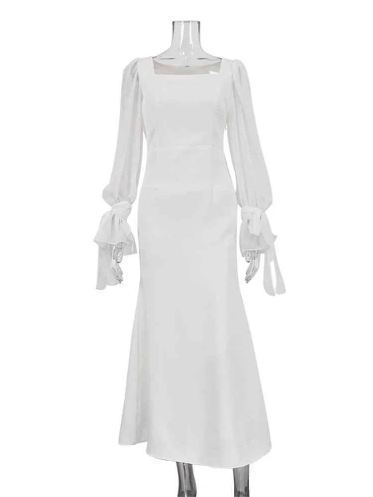 Женское длинное платье с оборками высокой талией и поясом