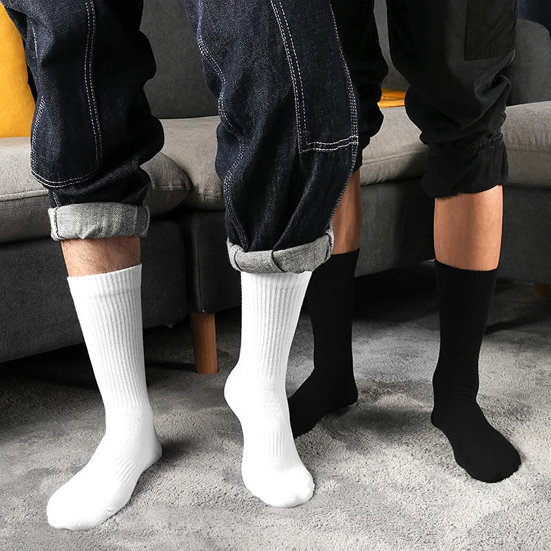 Socks men's autumn and winter solid color socks stockings black medium and high tube four seasons sports cotton socks