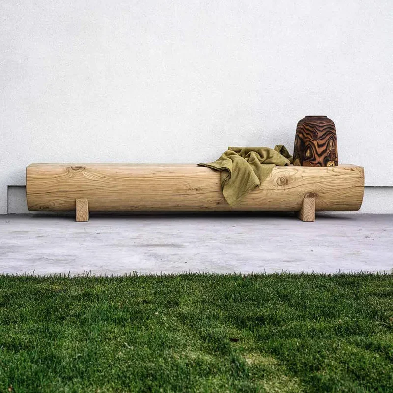 

Nordic solid wood long bench for homestays, resting on a wooden bench, with a cool and carbonized design
