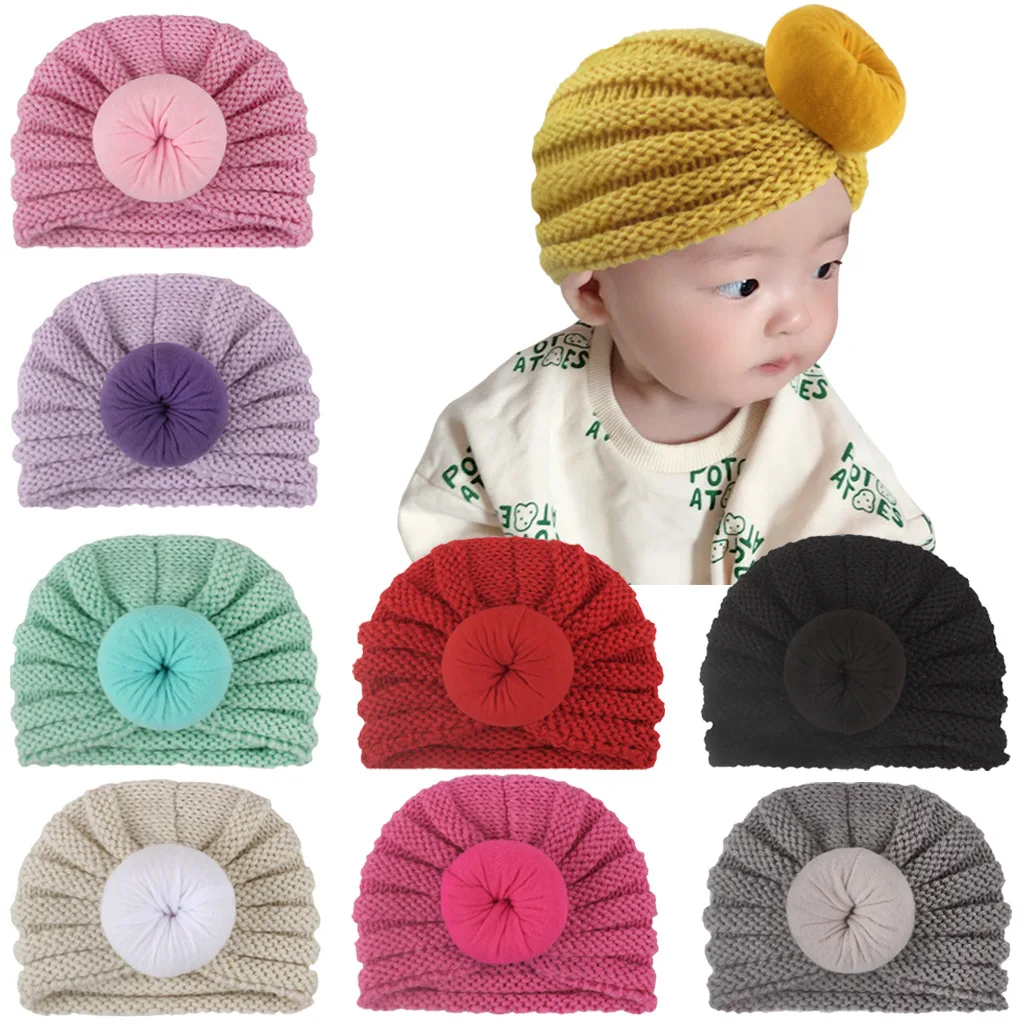 

New children's hats Baby solid color donut wool hats Autumn and winter warm hats