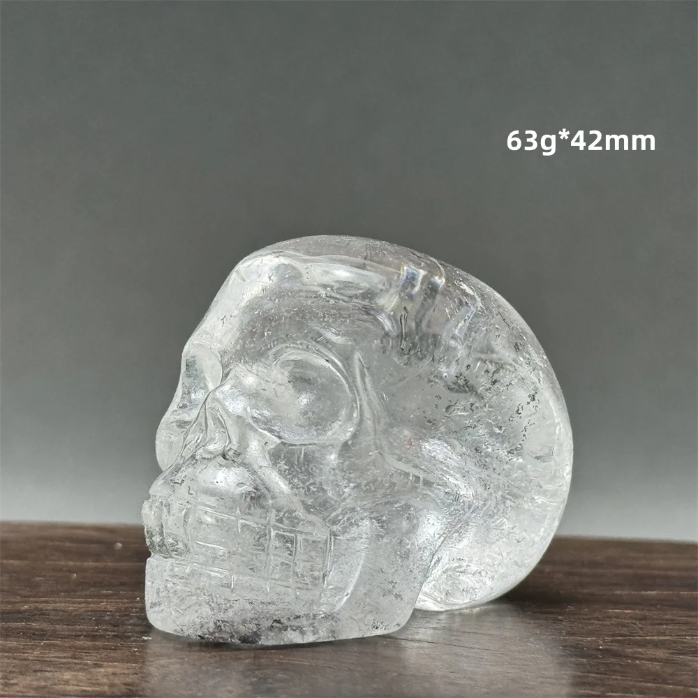 

Прозрачный кварцевый череп статуэтка