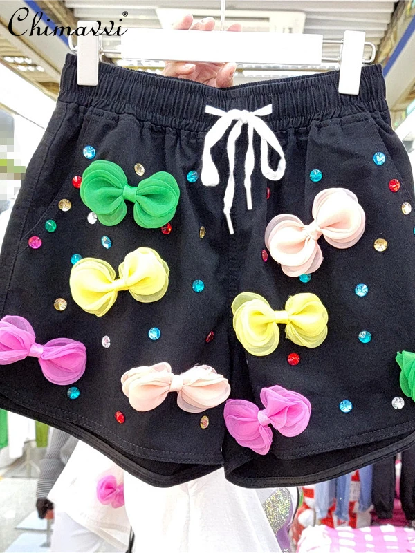 

European 2022 Summer New Heavy Beads Bow Jean Shorts Fashion High Waist Slimming Wide Leg Washed Denim Shorts for Women