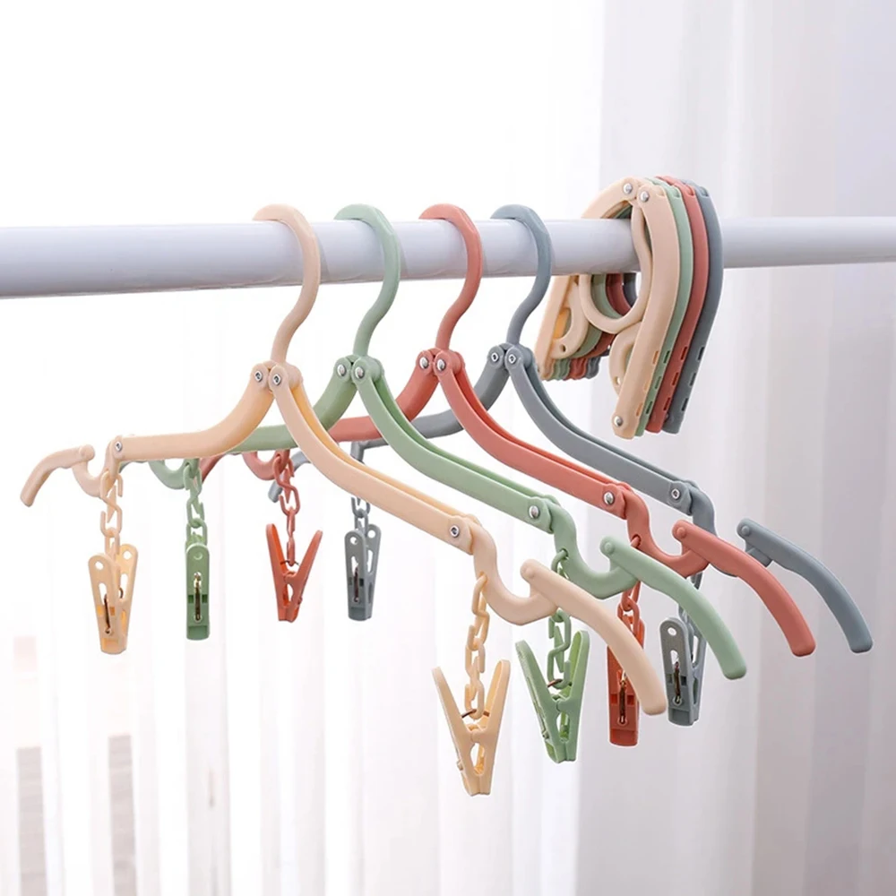 Portable Folding Travel Hangers Space Saving Multi-Functional Non-Slip Plastic Clothes Rack With Clips Storage Organizer images - 6