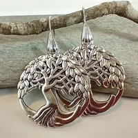 vintage metal hand carved tree of life womens hook drop earrings