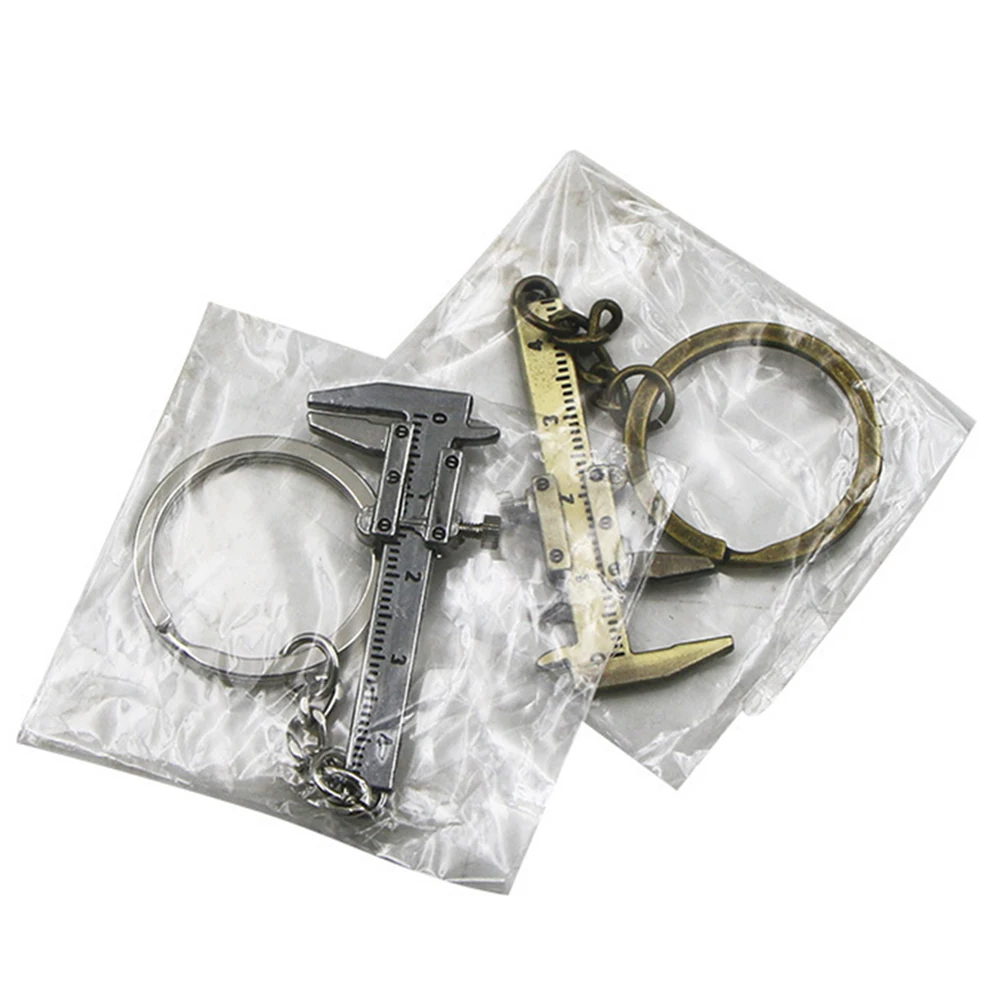 

Car Keychain Portable Mini Vernier Caliper 0-40mm Measuring Tool Keychain Clasp Ruler Hammer Wrench Pliers Shovel