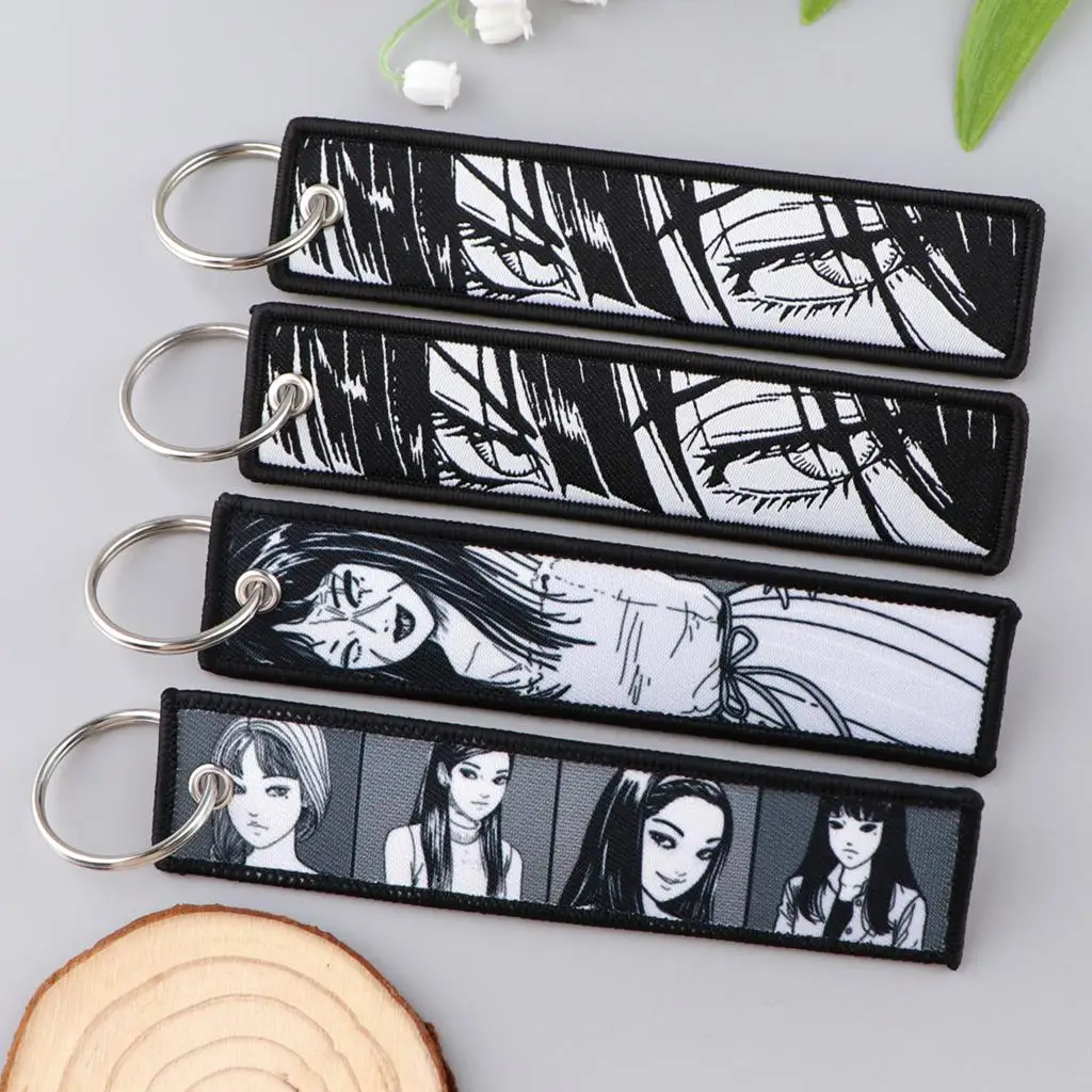 

Anime Junji Ito Tomie Key Tag Cool Embroidery Jet Tag Motorcycles Keychains Cars Backpack Accessories Gifts Adorn Key Rings 1PCS