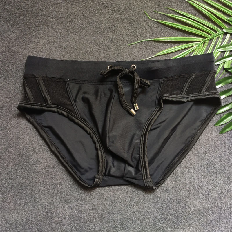 

Summer Men's Black Swimwear Sexy Mesh Side Bikini Swimming Pool Briefs With/Without Sponge Pad Low Waist Solid Patchwork Bequine