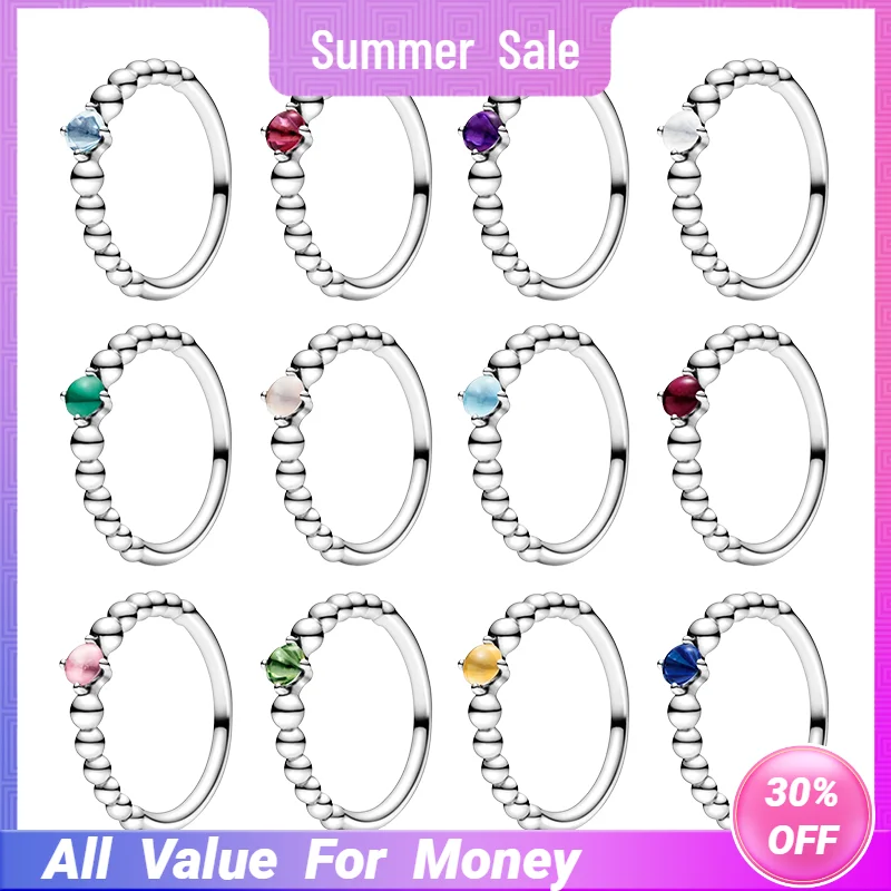 

Женское кольцо из серебра с бусинами и топазом